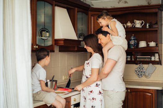 A joyful family cooking together in their cozy home kitchen, showcasing love and togetherness. Rent Own Starter Properties Canada Exclusive