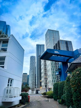 Modern bridge over scenic urban river.