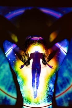 A silhouette emerges through colorful projections, evoking spirituality and energy.