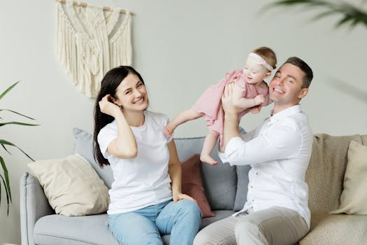 Father and daughter painting a cardboard house indoors, enjoying quality time together. Canadian Rent Transition Home Plans 2024